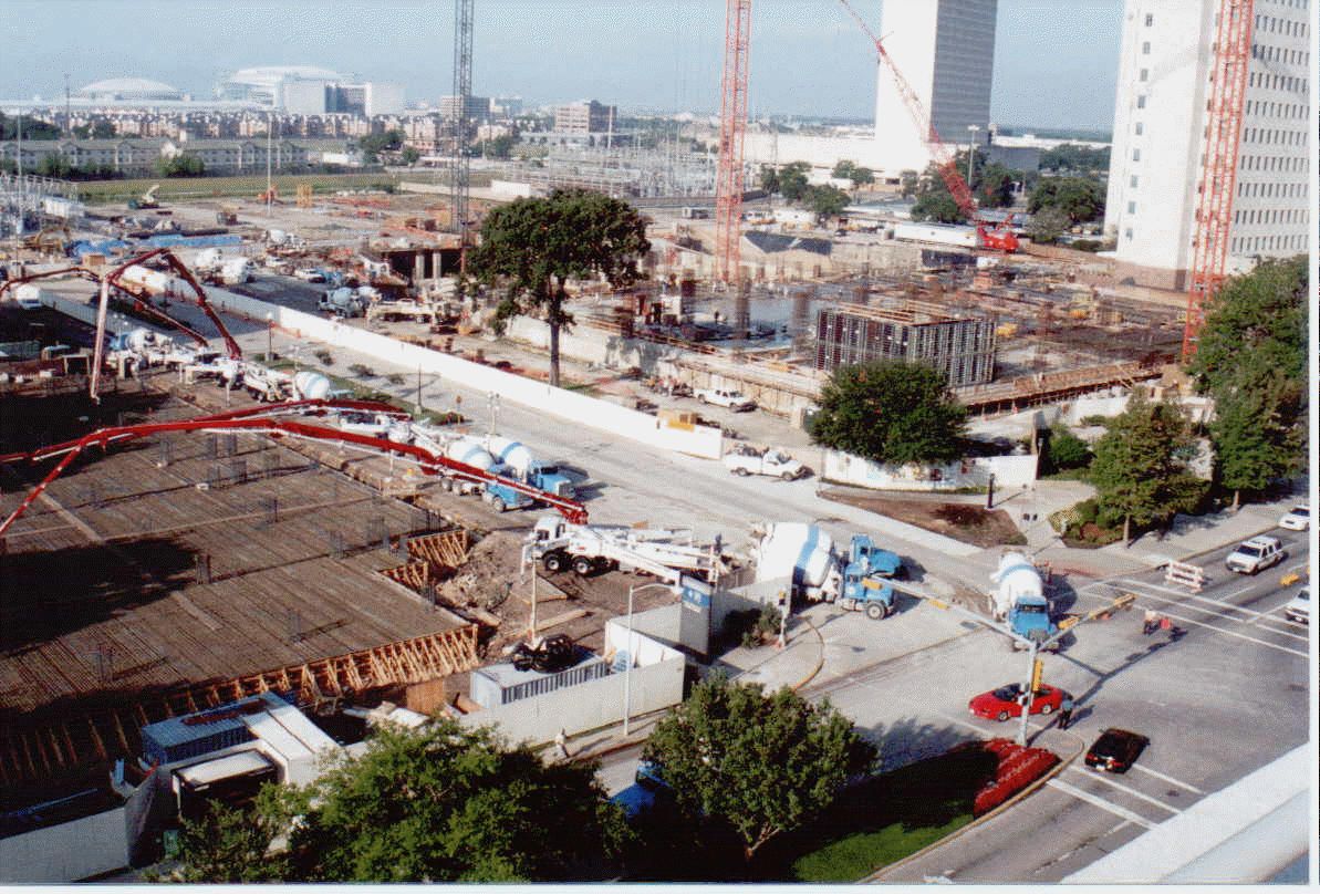 Four S.T.A.R. boom pumps over a downtown Houston slab pour