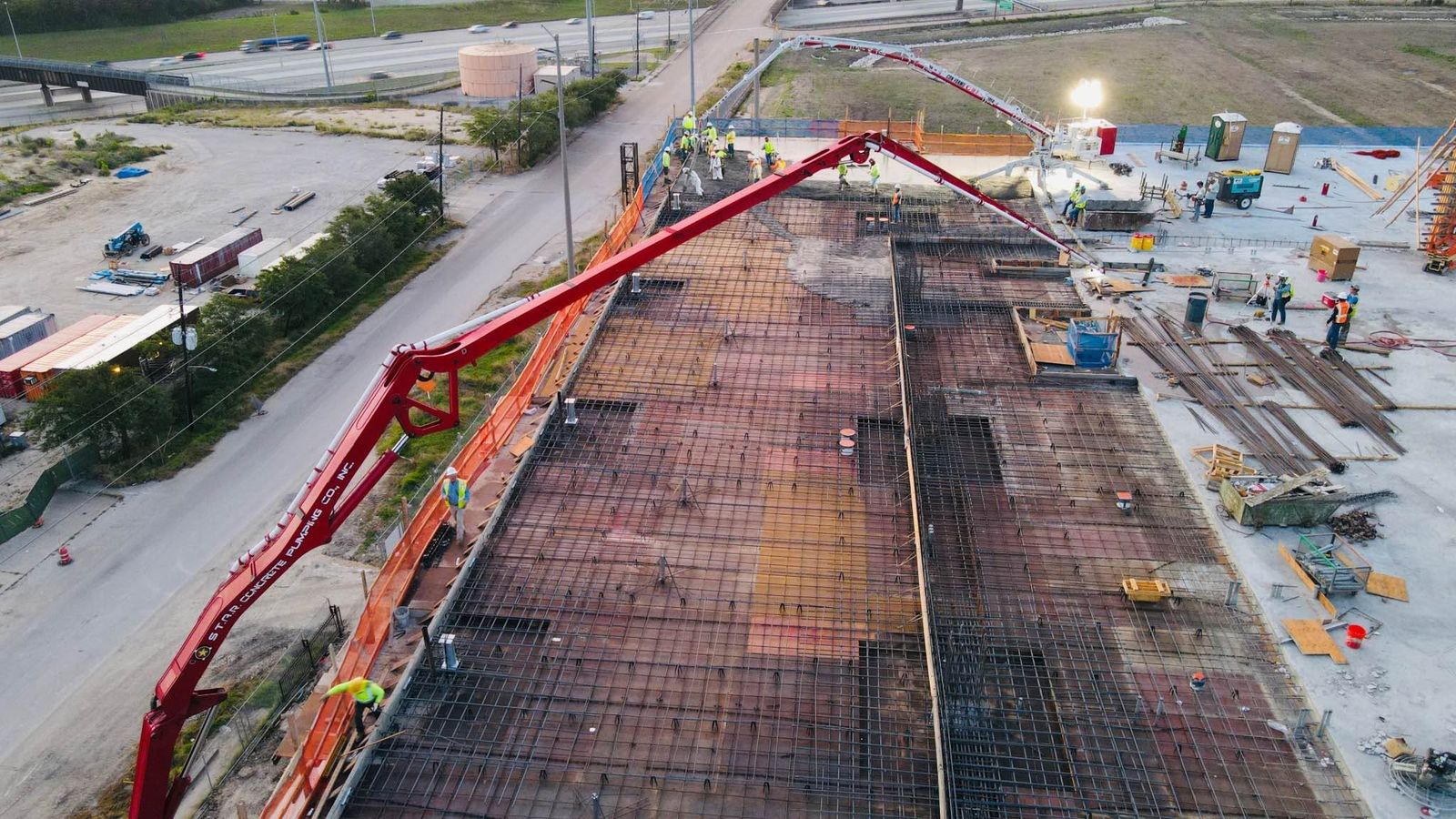 Aerial view of a S.T.A.R. boom on an elevated deck pour in Houston